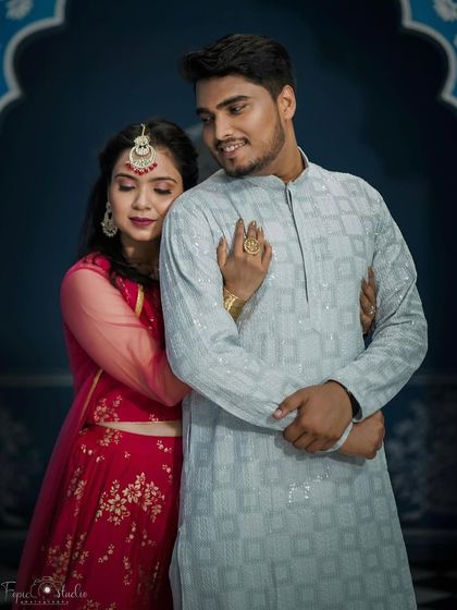 A romantic pose from the same event, showing how the makeup looks beautiful in a more intimate, close-up shot.