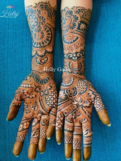 I love the precision of geometric designs. This full-hand piece, inspired by the work of another artist, plays with lines, checks, and repeating shapes to create a mesmerizing effect.