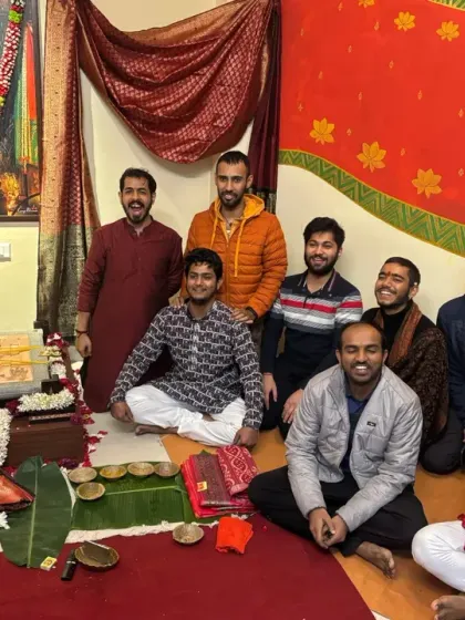 A group of men from our Sangha gathered around the Devi Yantra. This space is for everyone, a place to connect with devotion beyond gender or age.