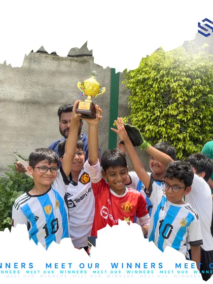 This is the moment all the hard work pays off. The pure joy of a team victory, lifting the trophy together. I ensure my players get regular competitive opportunities to test their skills, build teamwork, and experience the sweet taste of success.