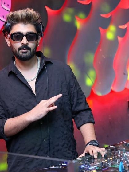 Pointing to the crowd, getting them involved.