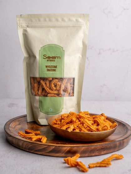 My Soya Sticks are perfect for the "let me just have one more" moment. This image shows the spicy, crunchy sticks in a brass bowl, a perfect chai-time snack.