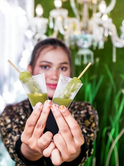 Our Kacchi Kairi (raw mango) ice golas, offering a tangy and sweet flavor that's perfect for beating the heat.
