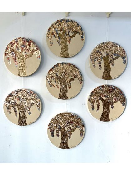 A set of seven artworks from the Diwali collection. The tree motif symbolizes growth, light, and new beginnings.