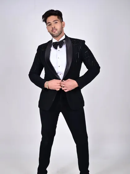 Another pose in the studio, highlighting the sharp cut and quality of our bespoke tuxedos.