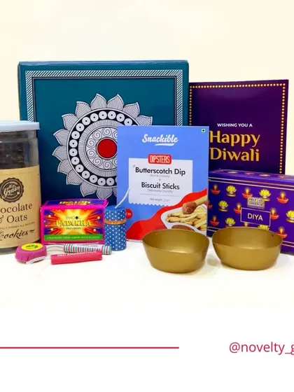 A fun and festive hamper for all ages. It includes chocolate and oats cookies, butterscotch dip biscuit sticks, a box of diyas, and even some sparklers, making it a complete celebration package.