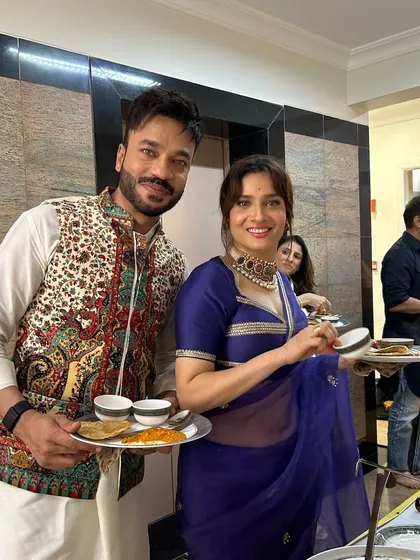 I love it when the stars align at my events. Here are the amazing Ankita Lokhande and Vicky Jain enjoying our festive spread. I bring that celebrity-approved vibe to every party, making sure your celebration is nothing short of spectacular.