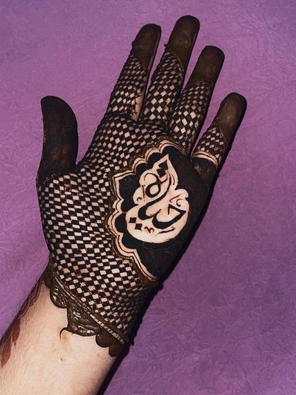 A bold and modern design featuring my own name, 'Hayat', in a stylish script against a checkerboard background.