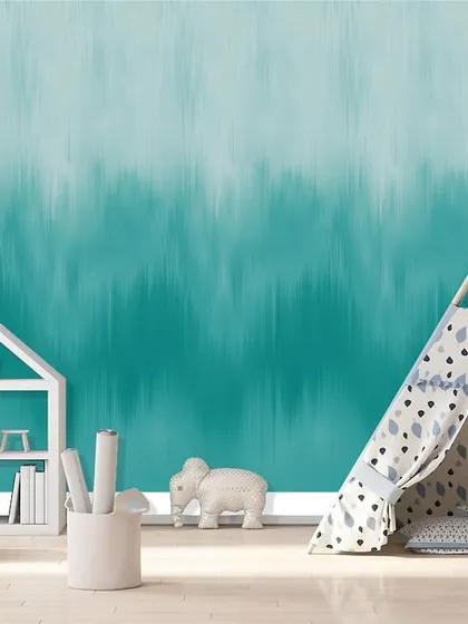 This textured teal ombre wallcovering is shown in a playful kid's room setting. The color adds a fun yet soothing element, perfect for a child's creative space.