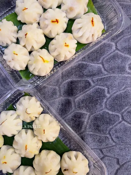 Another look at my handmade Ukdiche Modak, neatly arranged on banana leaves for an authentic touch.