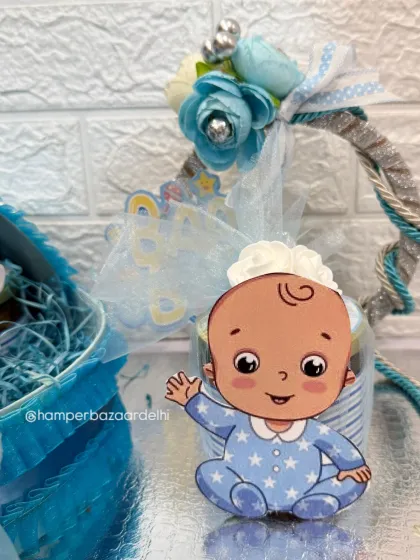 A close-up of the cute baby cutout included in our pram hampers.