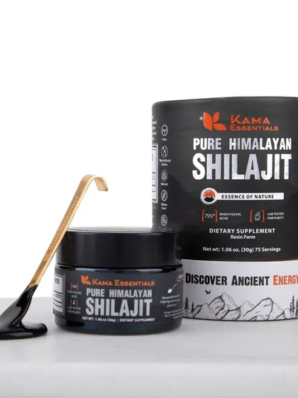 A high-quality creative shot of Pure Himalayan Shilajit, showcasing the product's viscous texture on a golden spoon next to its premium packaging.