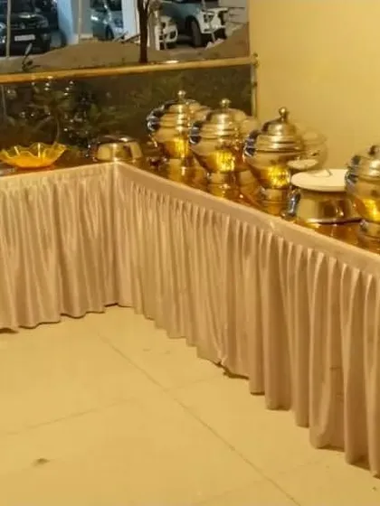 A clean and elegant buffet arrangement for a smaller gathering. We use high-quality serving dishes to maintain the food's temperature and presentation.
