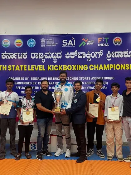 My team, Thunder Martial Arts, celebrating our victory at the 5th State Level Kickboxing Championship. We train as a team, we fight as a team, and we win as a team.