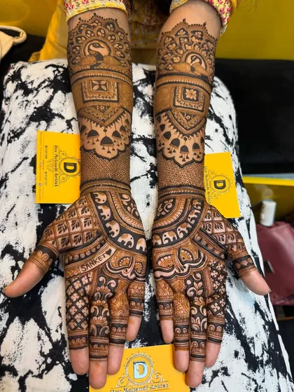 A clearer view of the engagement design, showcasing the peacock and elephant motifs. The symmetry and clean lines highlight my team's professional work.