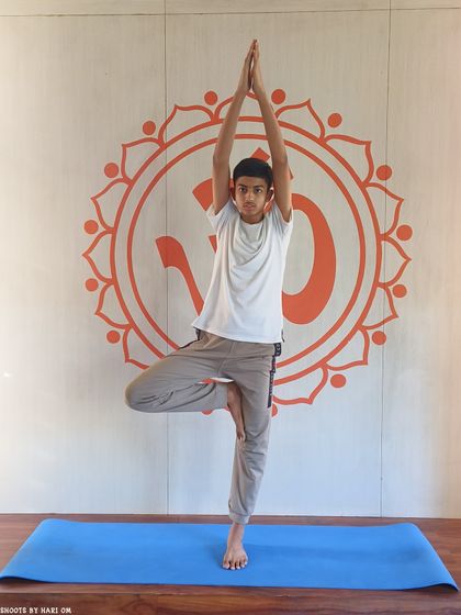 Vrikshasana (Tree Pose) is a wonderful asana for developing balance and focus, reflecting the principle of positive thinking and concentration.