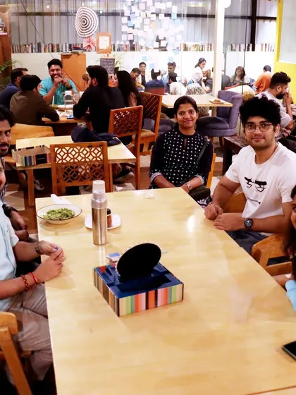 A moment of rest between games. Our cafe provides a welcoming atmosphere for gamers to relax and socialize.