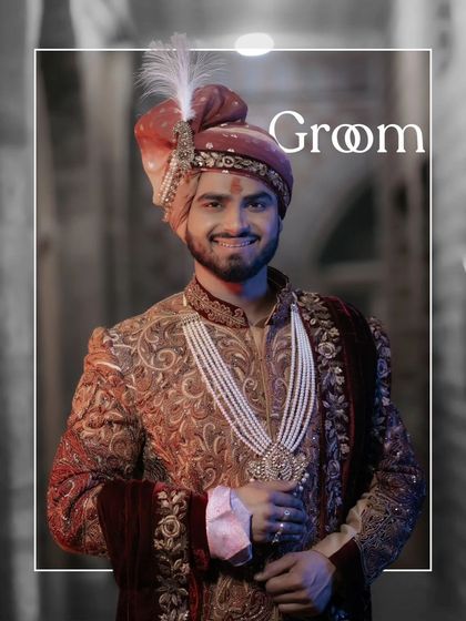 A handsome portrait of the groom, Akhilesh, in his ornate sherwani and turban, his smile radiating happiness.