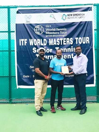 Receiving my award at the ITF World Masters Tour event in Telangana.