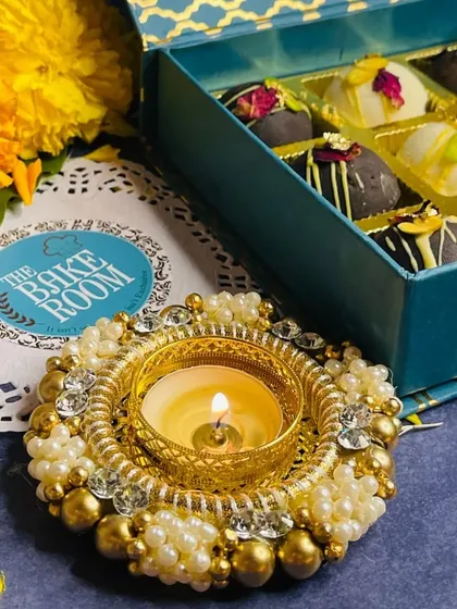Every detail matters, which is why many of my Diwali hampers come with a beautiful, reusable diya. It's a small touch to make your festival of lights even brighter.