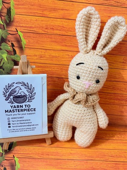 A tiny 6-inch bunny with a sweet expression and a ruffled collar. It's a perfect pocket-sized companion.