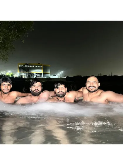 Relaxing with my friends after a long week. Recovery and social connection are just as important as training hard.