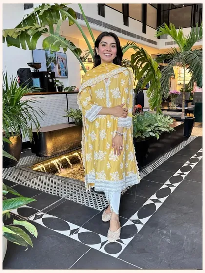 This sunny yellow kurta set is sure to brighten your day. The delicate white embroidery and relaxed fit make it a comfortable and stylish choice.