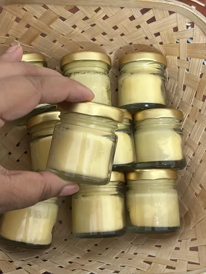 Getting a batch of mini yellow scented candles ready. These are perfect for bulk orders for haldi ceremonies or other festive events.