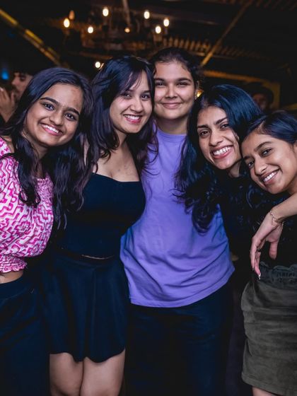 A group of friends sharing a happy moment together.