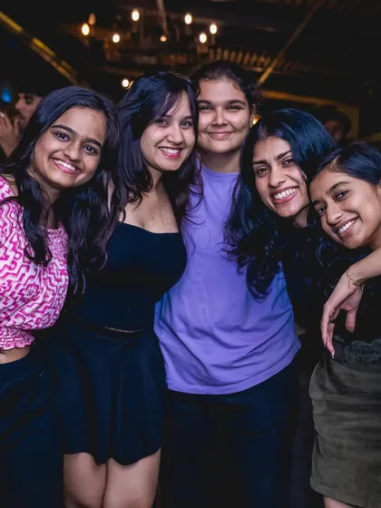 A group of friends sharing a happy moment together.