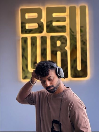 Adjusting the sound, fully concentrated on the music. Every set, big or small, gets my full attention.