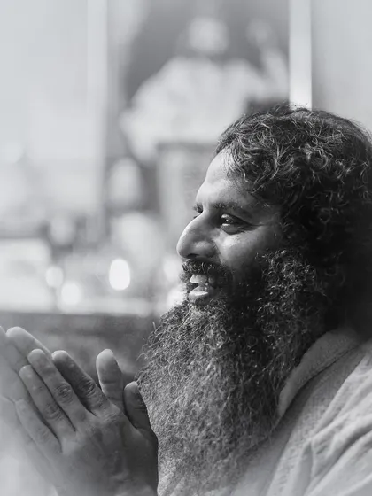 This is a portrait of my guru, Shri Maitreya ji, captured in a moment of divine presence. My spiritual portrait sessions are for anyone seeking to connect with their deeper self, creating an image that serves as a guide and an inspiration.