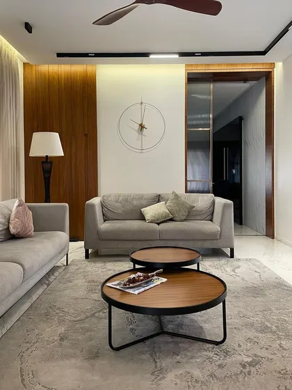 A comfortable and stylish living room from a Cantilever Architects project, featuring our custom sofas and nested coffee tables. The design focuses on clean lines and high-quality materials for livable luxury.
