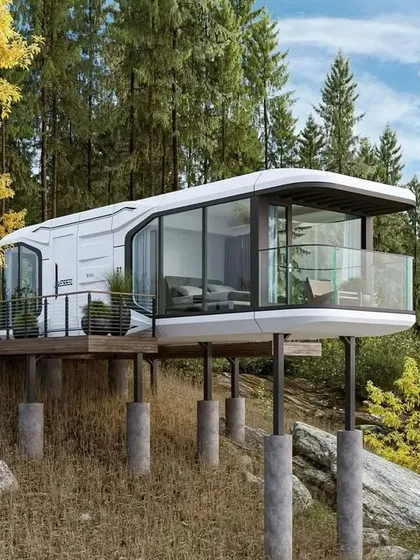 This futuristic home design, elevated on pillars, is perfect for sloped or uneven terrain. It’s a prime example of how we use innovative modular architecture to create unique holiday homes in just 45 days.