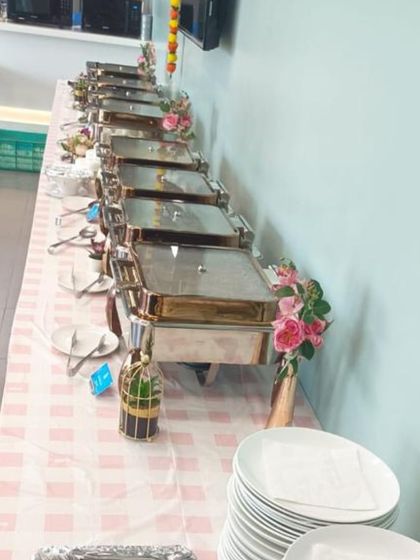 Another angle of the buffet line at Jotun India's Diwali celebration, highlighting the organized and appealing presentation.