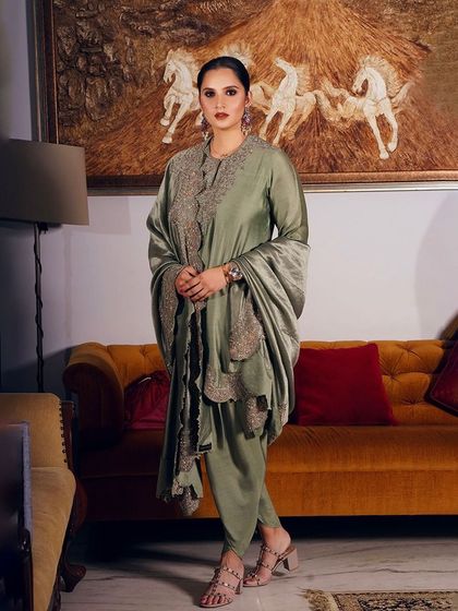 Sania Mirza exudes grace in this full-length shot of the Jayanti Reddy tunic. The draped silhouette and intricate embroidery make it a standout piece for any occasion.