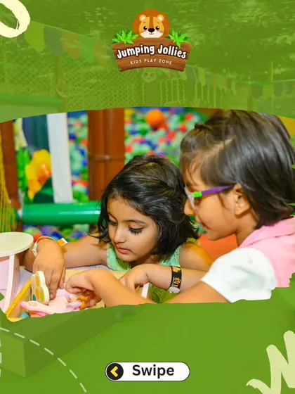 Two friends engaged in pretend play with our mini kitchen set. This is a wonderful way for toddlers to learn social skills and use their imagination.