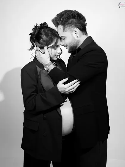 An intimate black and white portrait of Pria and Millind. These quiet moments of connection are just as important as the grand poses.