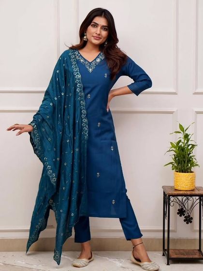 A stylish blue viscose chanderi kurta pant set. The heavy thread embroidery and sequin work on the dupatta add just the right amount of sparkle.