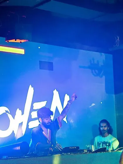 A shot of me under blue lights at Mikachi Club.