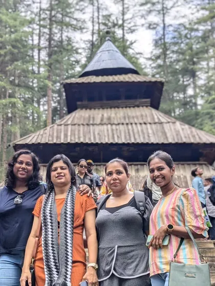 The group visiting the ancient Hadimba Devi Temple in Manali, a wooden temple set in a cedar forest.