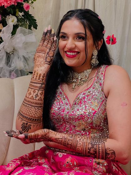Another beautiful portrait of Raksha, looking radiant and happy with her henna.