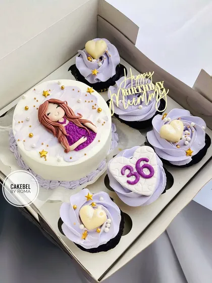 A beautiful bento cake and cupcake combination for a mother's 36th birthday. The lavender-themed set includes a mini cake with a custom fondant topper and coordinating cupcakes with hearts and a "Happy Birthday Mummy" sign.