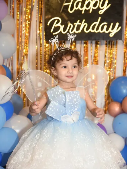 A magical portrait of the birthday girl dressed as a fairy, complete with a wand and wings. I love creating these special, posed shots that capture the theme of your child's party and their adorable personality.