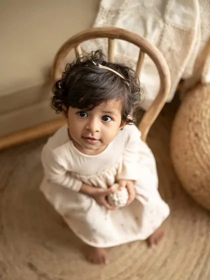 When mama says NO SUGAR. This little one's expression is priceless. Capturing these funny, real moments is part of the fun of toddler photography.