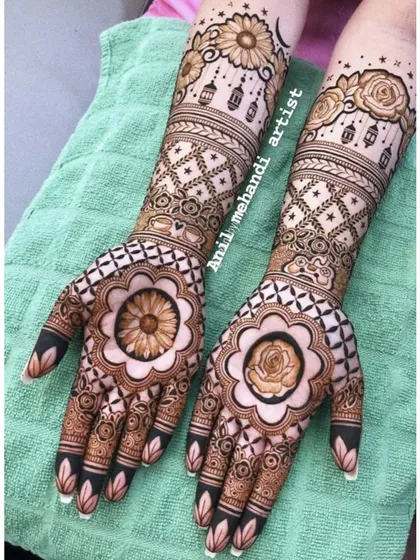 A unique bridal design featuring roses and hanging lanterns. The palms have a large floral mandala, perfect for a modern bride.
