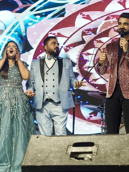 "Wife rocked and husband shocked!" Capturing these priceless, candid reactions during on-stage games is my specialty. It's these fun, interactive segments that make a Sangeet night truly unique and entertaining for everyone.