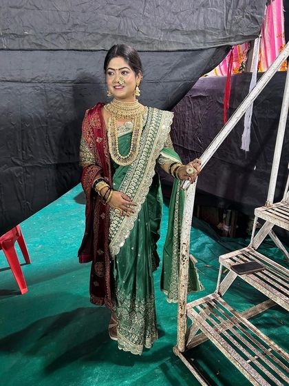 This stunning green Nauvari is perfect for a bride who wants a rich and traditional look on her wedding day.