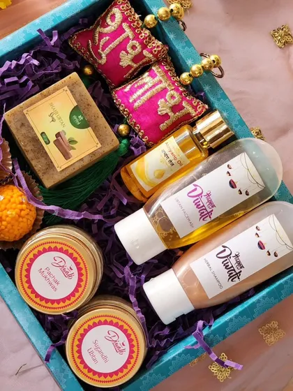 This is one of my signature Diwali hampers, combining the best of my creations. It includes Ayurvedic bath and body products from the Abhyang Snan kit, along with my popular Motichoor Ladoo candles and other festive treats, making it a complete and thoughtful gift.