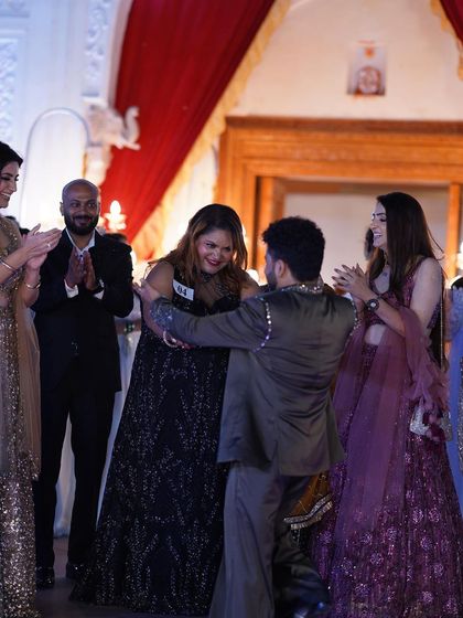 The winner celebrating her victory on stage. Her joy is infectious.